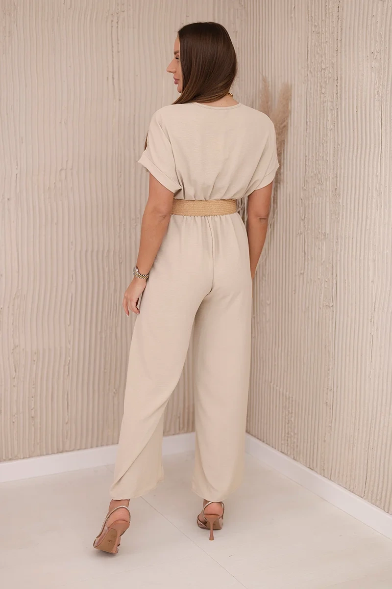 Kombinezon z ozdobnym paskiem w talii beżowy - obrazek 3