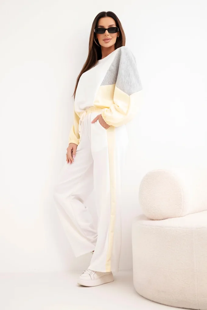 Komplet damski masełko z luźną bluzą i spodniami z szeroką nogawką żółty
