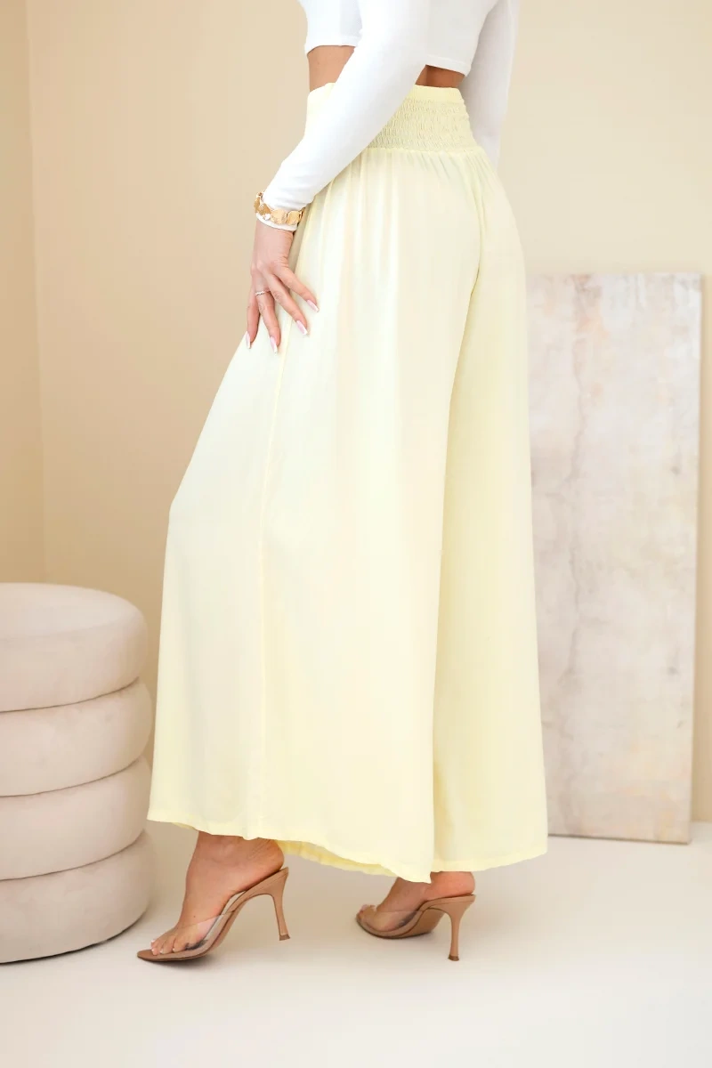 Spodnie damskie wiskozowe z elastycznym pasem żółte - obrazek 3