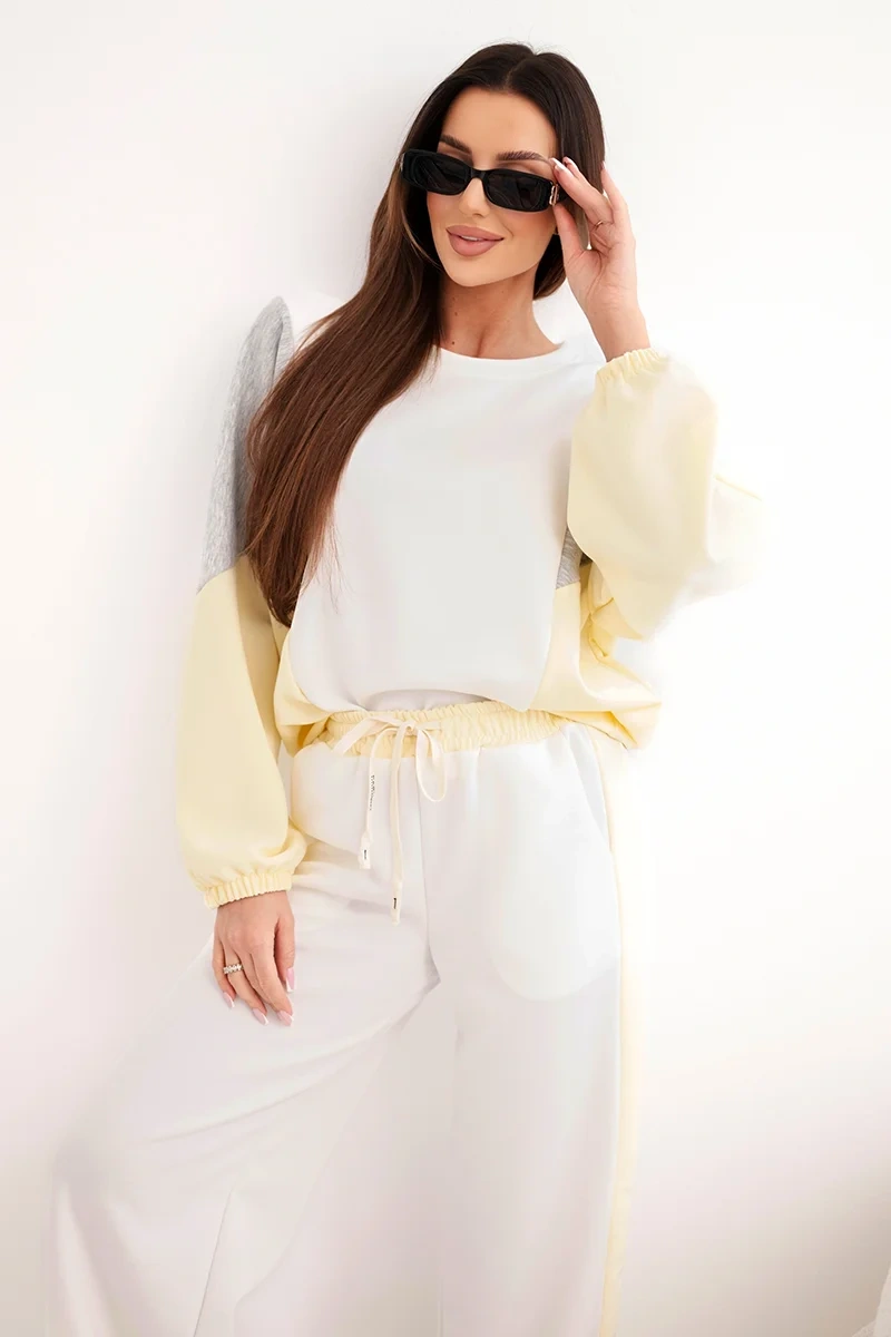 Komplet damski masełko z luźną bluzą i spodniami z szeroką nogawką żółty
