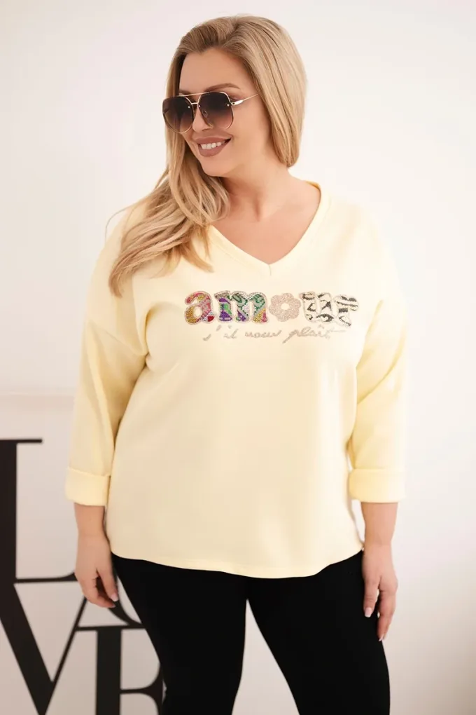 Bluza damska Plus Size z napisem i dekoltem V żółta