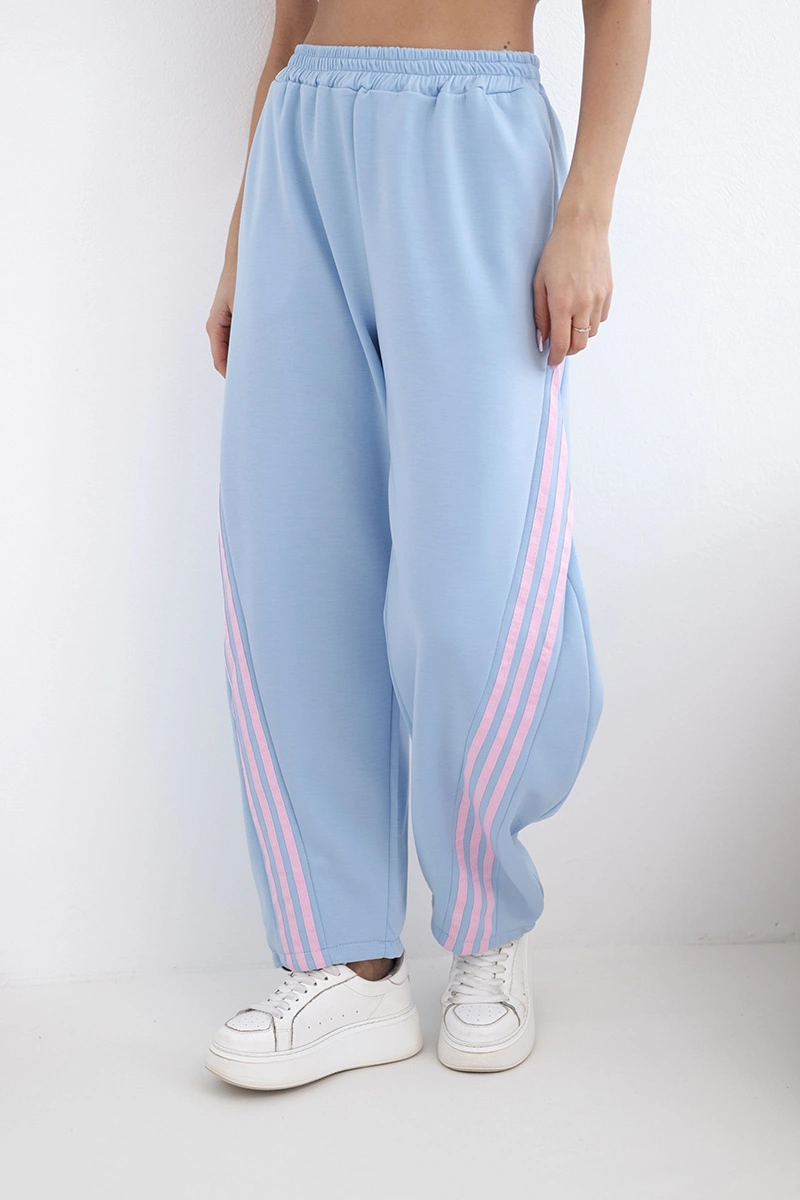 Spodnie damskie masełkowe z wiskozy z lampasem niebieskie