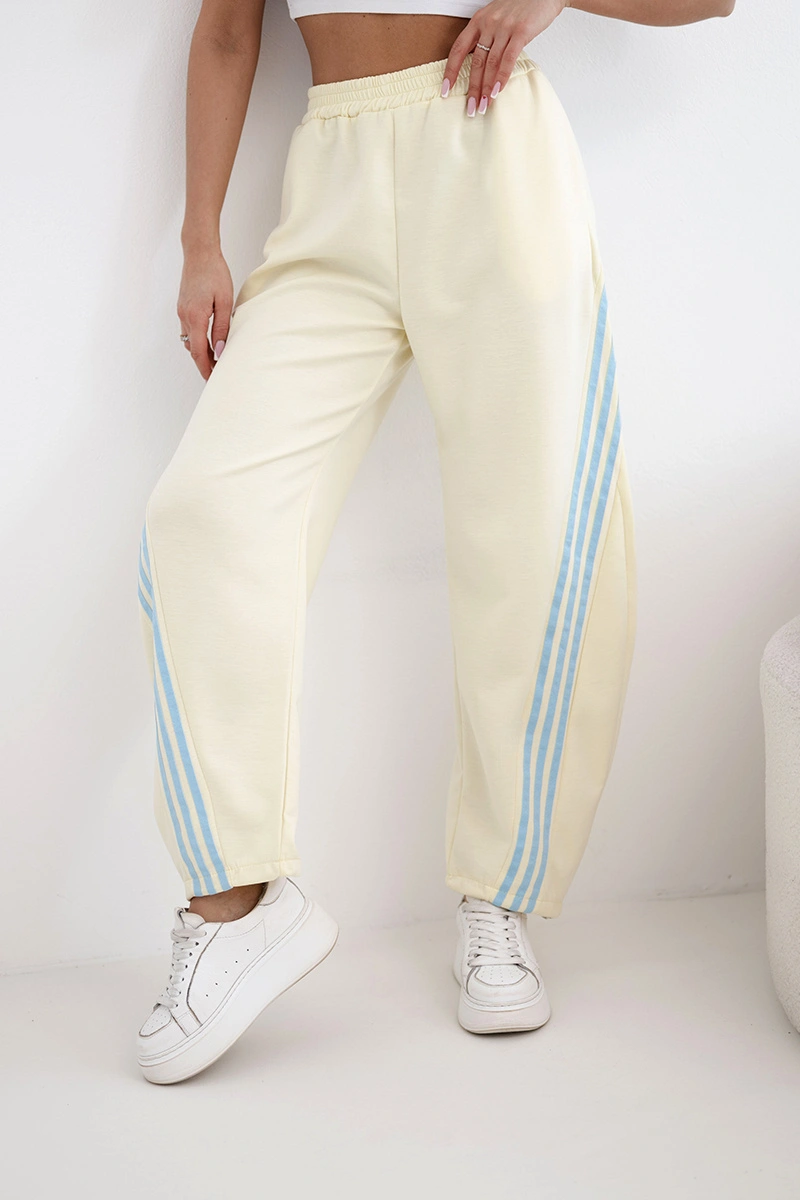 Spodnie damskie masełkowe z wiskozy z lampasem żółte