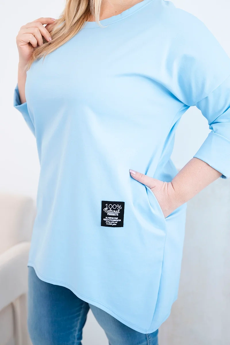 Bluzka damska Plus Size z dłuższym tyłem i długim rękawem niebieska - obrazek 4