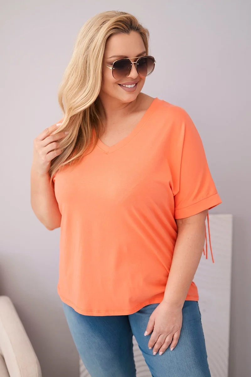 Bluzka damska bawełniana Plus Size z dekoltem V i frędzlami na plecach łososiowa - obrazek 2