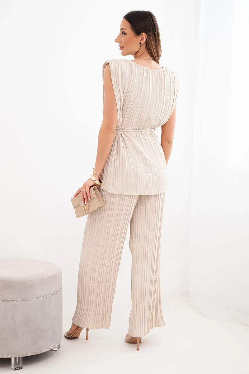 Komplet damski wiskozowy plisowany z wiązaną bluzką i szerokimi spodniami beżowy - obrazek 3