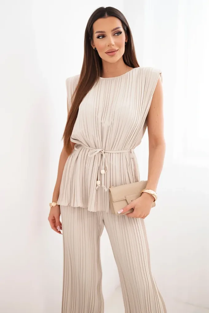 Komplet damski wiskozowy plisowany z wiązaną bluzką i szerokimi spodniami beżowy