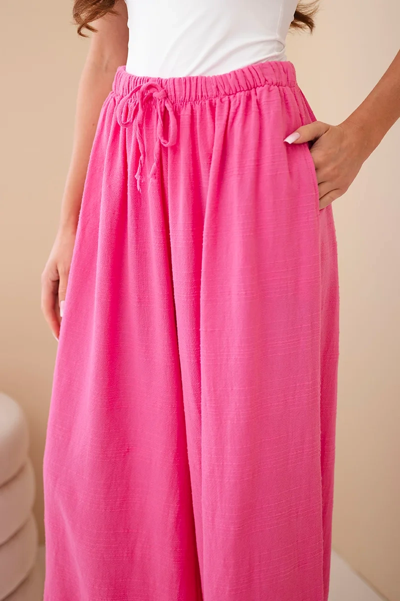 Spodnie damskie szerokie bawełniane z gumką w pasie różowe - obrazek 4