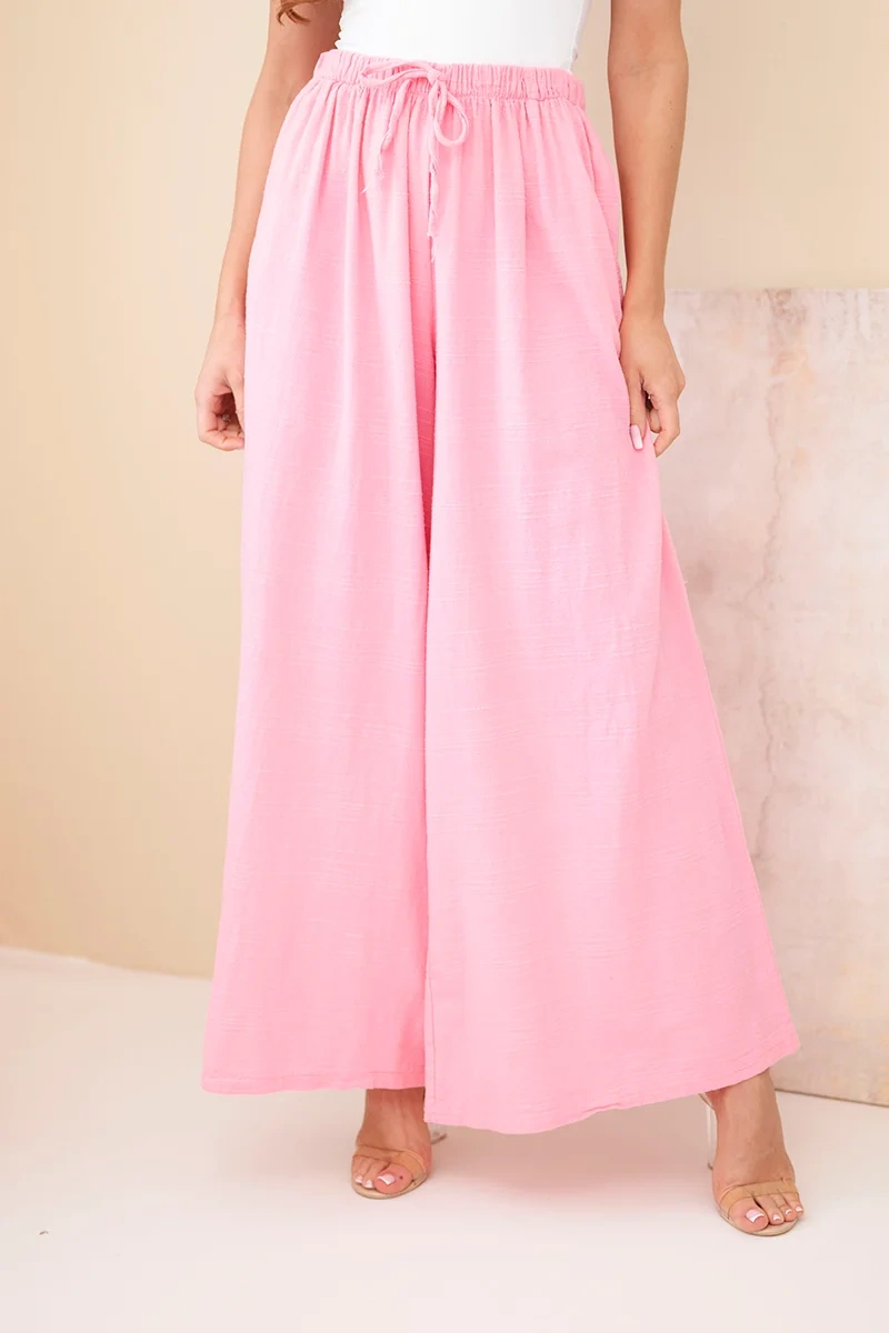 Spodnie damskie szerokie bawełniane z gumką w pasie cukierkowy róż