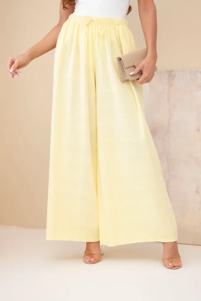 Spodnie damskie szerokie bawełniane z gumką w pasie żółte