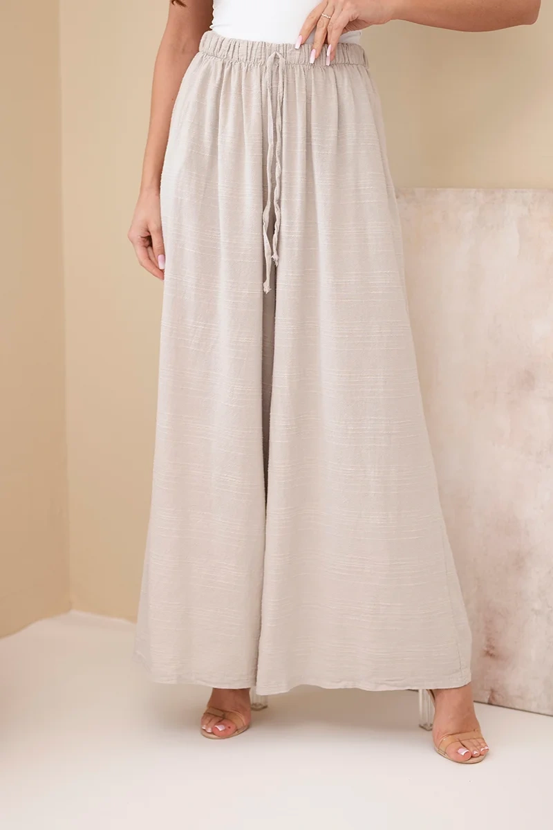 Spodnie damskie szerokie bawełniane z gumką w pasie beżowe