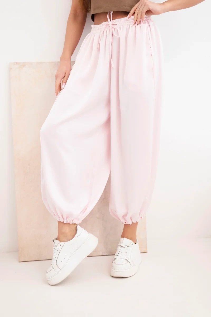 Spodnie damskie szerokie z gumką w pasie i wiązaniem typu alladynki cukierkowy róż