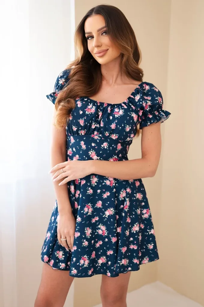 Sukienka damska w kwiaty z bufiastym rękawem i elastyczną talią granatowa